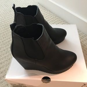 Black leather wedge booties
